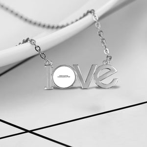 Couple pendant necklace with the letters LOVE